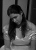 Depression - Me posing depressed. I'm wearing my mother's once but never worn wedding dress. She put me in it and took pictures all because she believes I will never get a husband. ^^