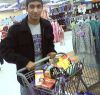 Me rolling my cart full of condums, tampons, loction, knee pads, helmet, and preg test stuff.. LOL!!! - 