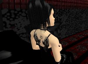  - I like to take random pictures of my avi! XD
-i feel hyper, i'm not sure why- *twitches* Grr, I twitched! 
Anyways look its my tattoo! awesome. I'm H-Y-P-E-R! 

I am going to calm down know before  --oh my god! get away!! *rips apart the table in evil manner!!*-- before that, sorry the air was touching me...